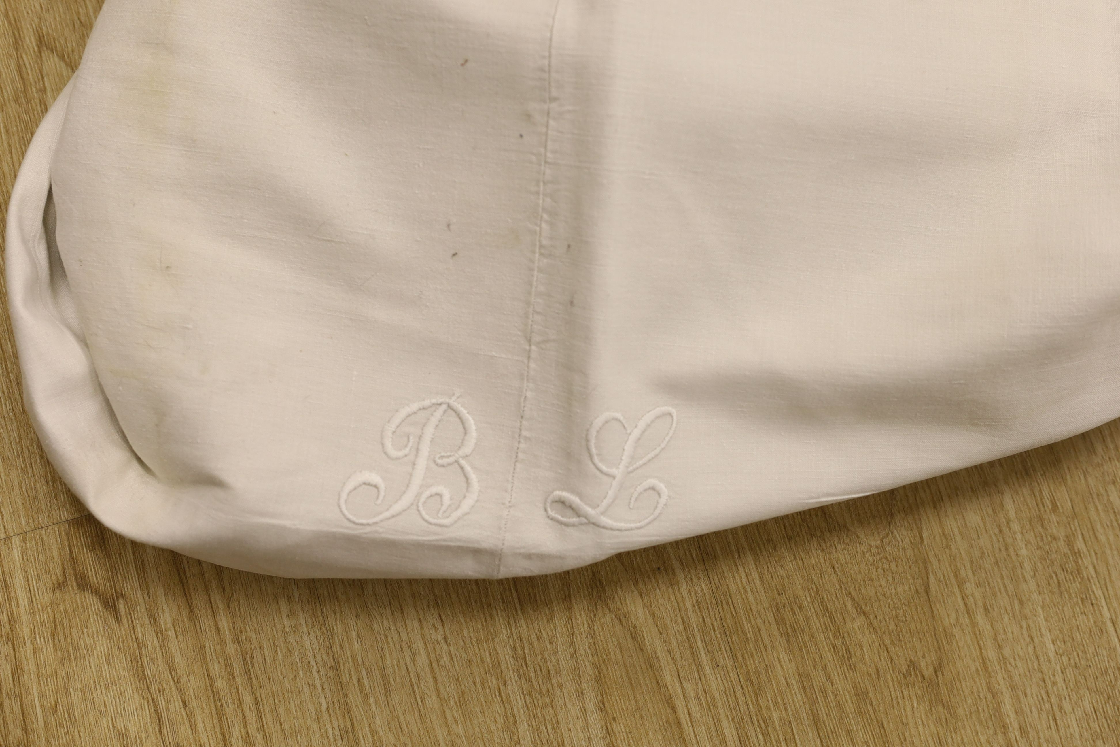 Twelve French provisional coarse linen sheets with embroidery.